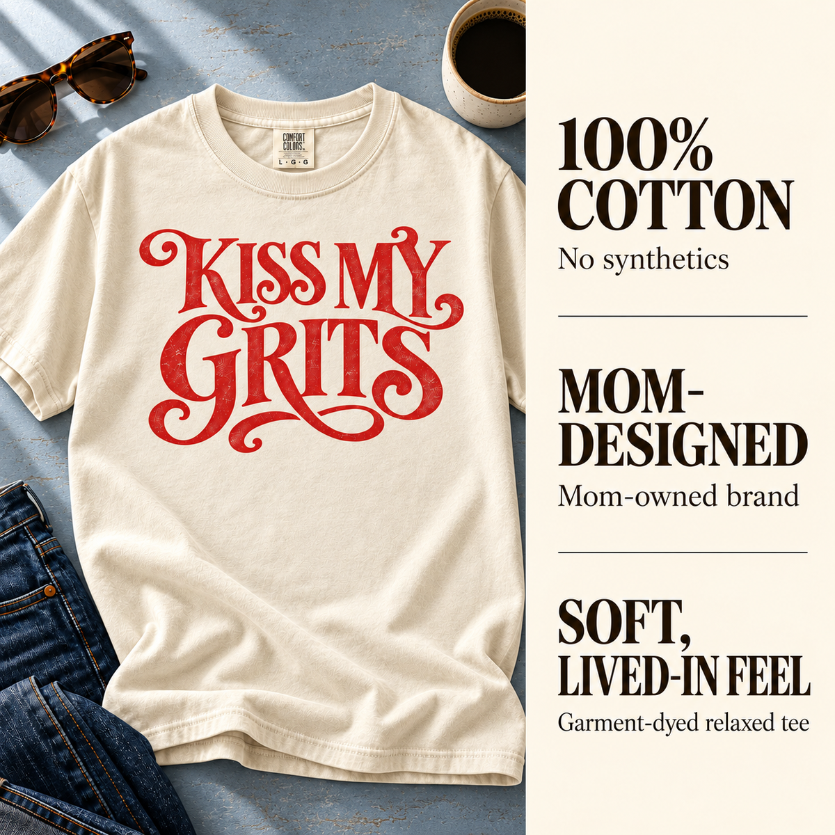 Ivory Kiss My Grits tee with 100% cotton, mom-owned brand, and garment-dyed fabric details.