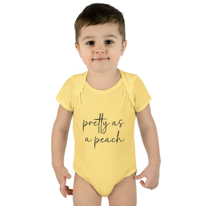 Banana Pretty as a Peach baby bodysuit, worn on a toddler model.