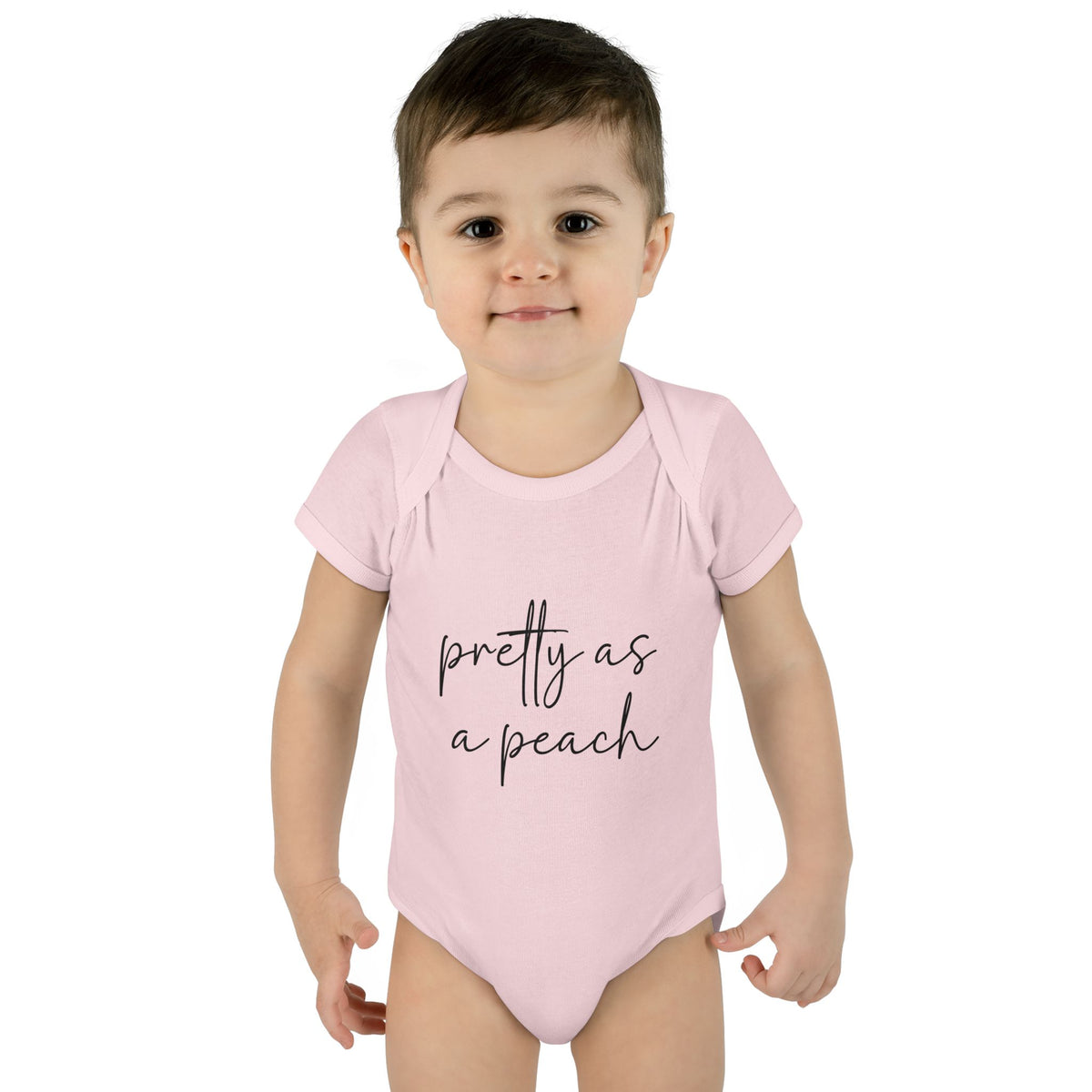 Ballerina Pretty as a Peach baby bodysuit, worn on a toddler model.