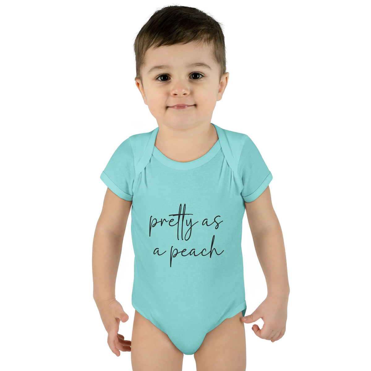 Chill Pretty as a Peach baby bodysuit, worn on a toddler model.