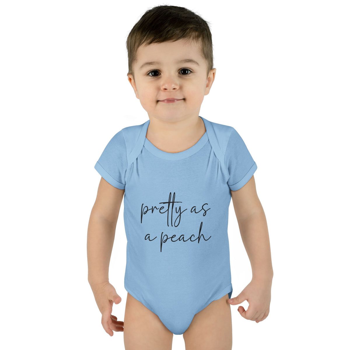 Light Blue Pretty as a Peach baby bodysuit, worn on a toddler model.