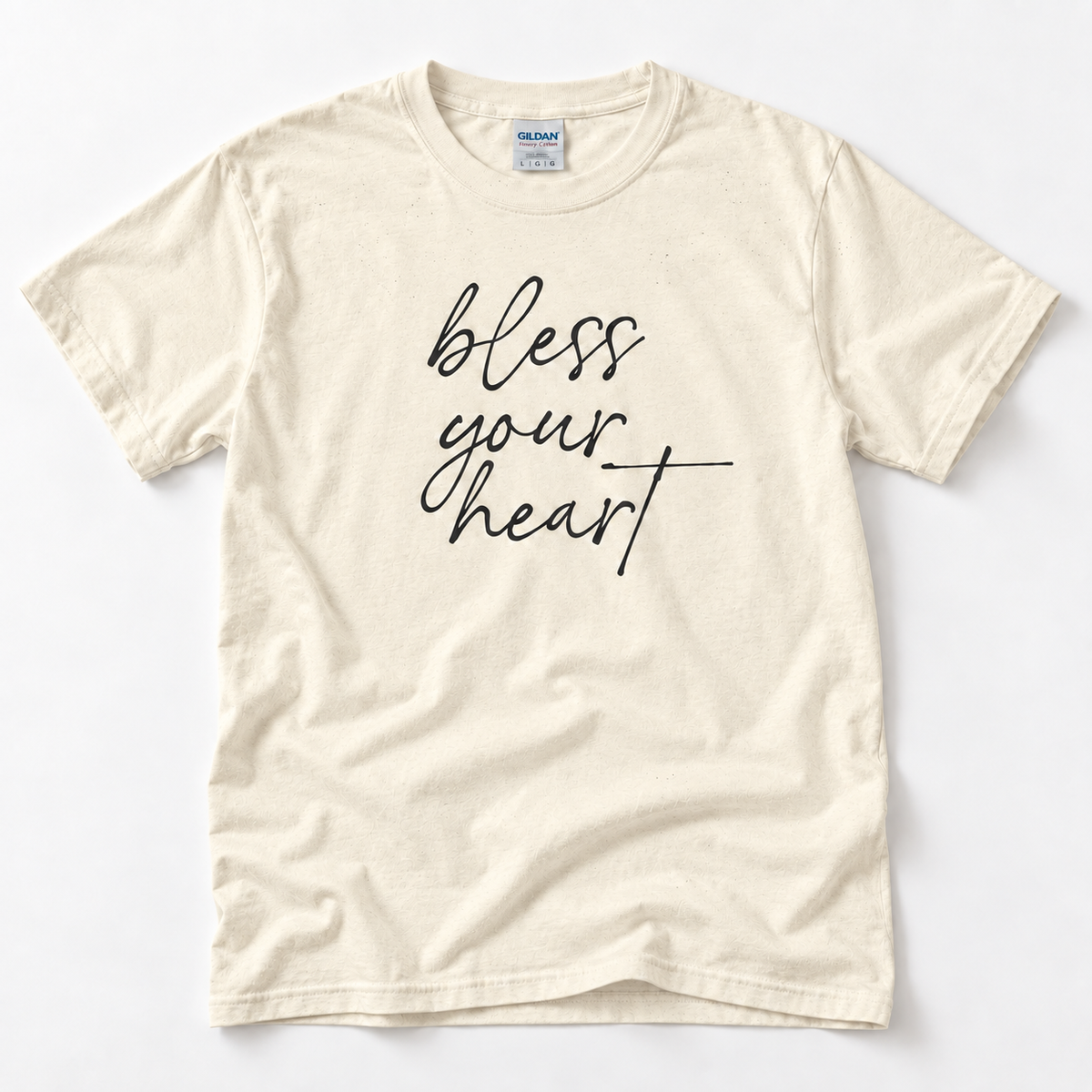 Natural Bless Your Heart adult T-shirt laid flat with black script lettering.