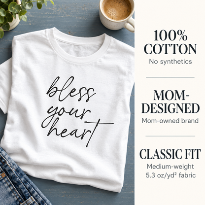 White Bless Your Heart tee with callouts for cotton, mom-owned brand, and classic fit.