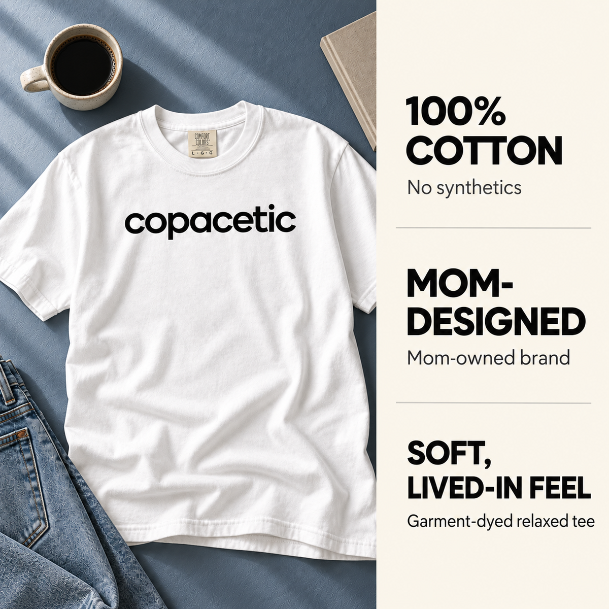 White Copacetic tee with callouts for 100% cotton, mom-owned brand, and garment-dyed fabric.